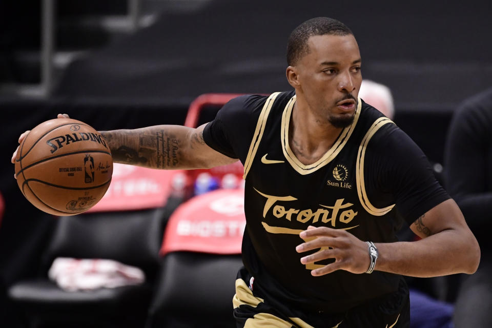 Norman Powell dribbles the ball during a game.