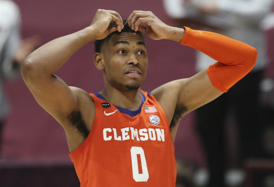 Clemson's Clyde Trapp 0 reacts to a missed scoring opportunity in the second half of an NCAA college basketball game in Blacksburg Va., Tuesday, Dec. 15, 2020. (Matt Gentry/The Roanoke Times via AP, Pool)