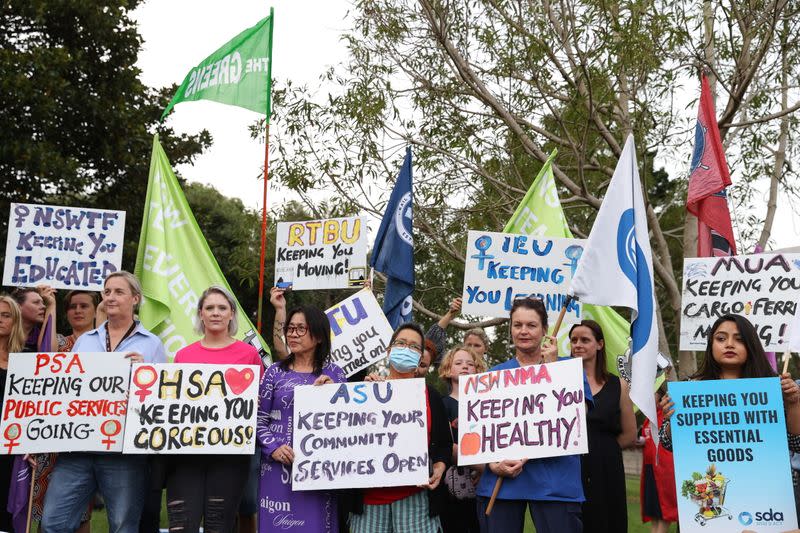 People participate in a rally for International Women's Day in Sydney