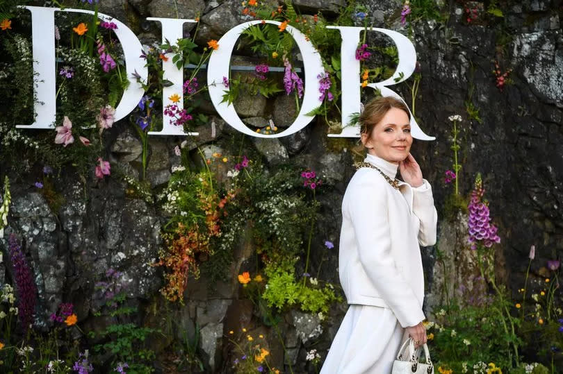 Singer Geri Halliwell stunned in a classic white ensemble -Credit:Getty Images