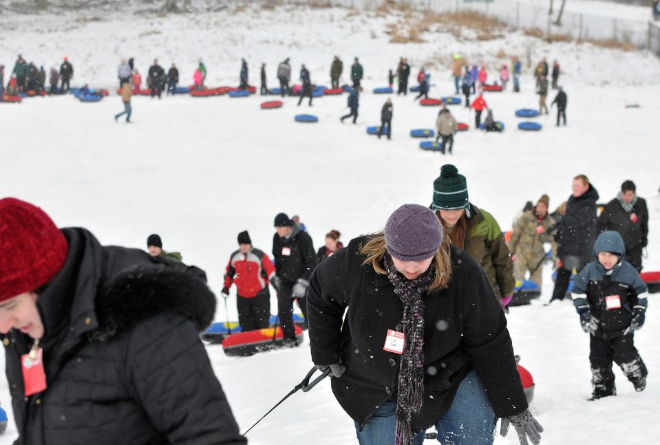 Hawk Island Park is located at 1601 East Cavanaugh Road; the tubing hill is situated along the hiking path behind the parking lot on the right-hand side of the entrance, with plenty of signage to guide visitors.