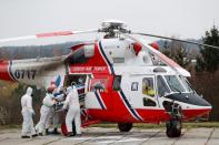 Medical workers transport COVID-19 patients from Brno to Prague