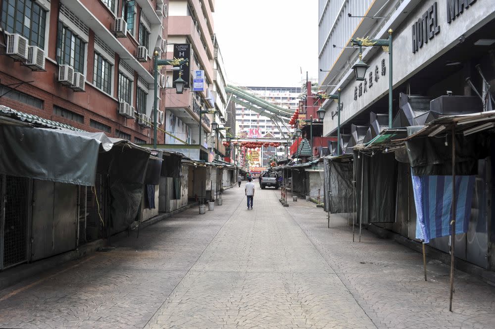 A general view of the near-deserted Petaling Street in Kuala Lumpur on March 19, 2020. — Picture by Shafwan Zaidon