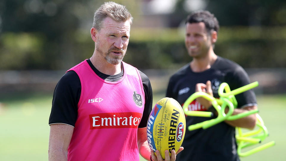 Pictured here, Collingwood coach Nathan Buckley at a Magpies training session.