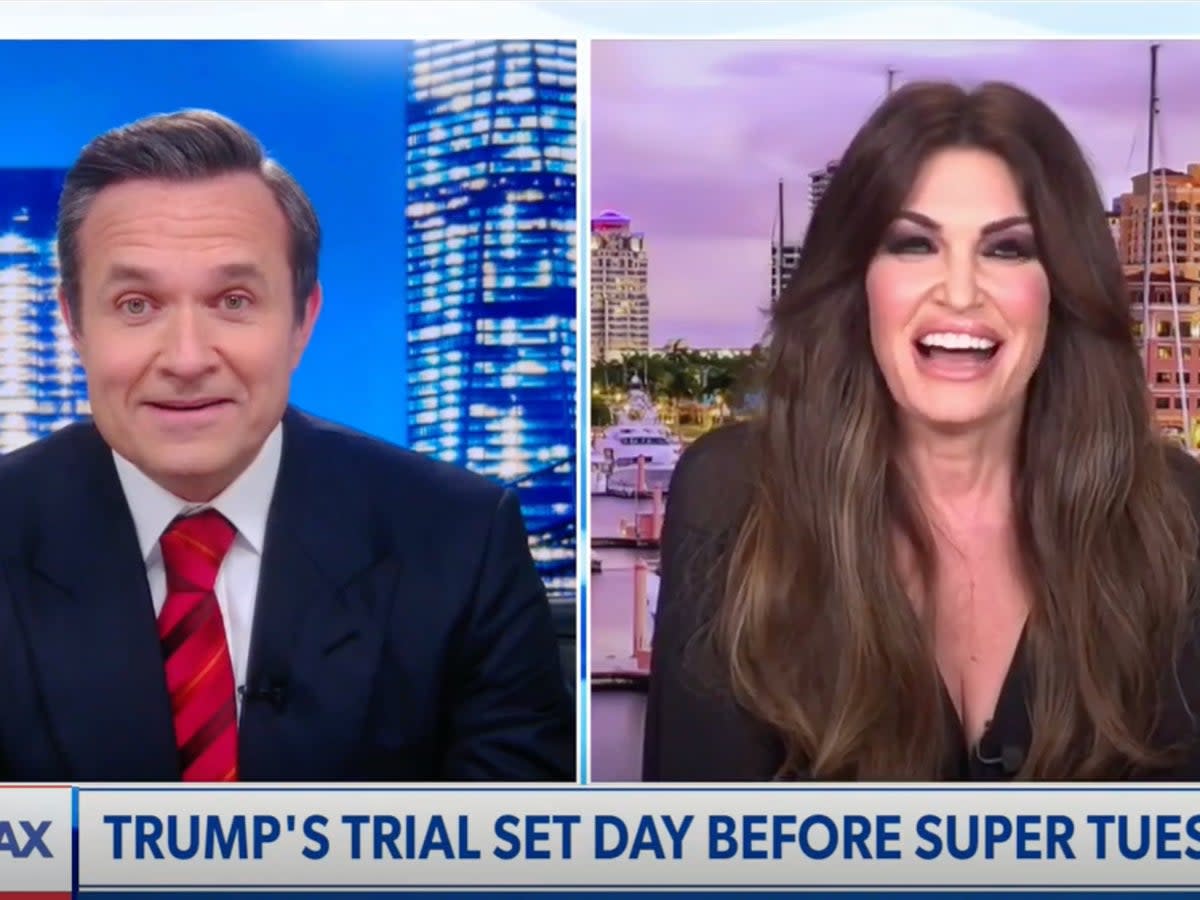 Kimberly Guilfoyle was forced to defend her engagement to Donald Trump Jr in awkward Newsmax interview (Newsmax / Screengrab)