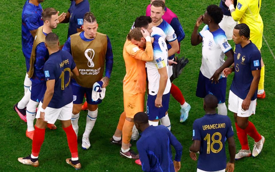 France's Hugo Lloris with England's Harry Kane after the match as France progress to the semi finals - REUTERS