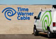 A cable truck returns to a Time Warner Cable office in San Diego, California in this file photo from December 11, 2013. REUTERS/Mike Blake/Files