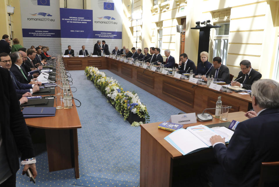 European Union heads of state attend a round table meeting at an EU summit in Sibiu, Romania, Thursday, May 9, 2019. European Union leaders on Thursday start to set out a course for increased political cooperation in the wake of the impending departure of the United Kingdom from the bloc. (Ludovic Marin, Pool Photo via AP)