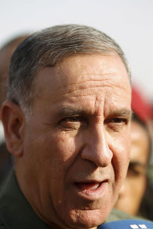 Iraqi Defence Minister Khaled al-Obeidi speaks to the media during his visit to military cadets in Baghdad, September 22, 2015. REUTERS/Ahmed Saad/File Photo