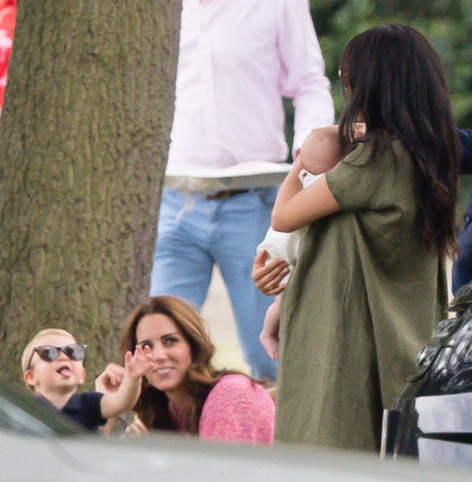 Prince Louis poking tongue out and wearing Kate's sunglasses at polo, 2019