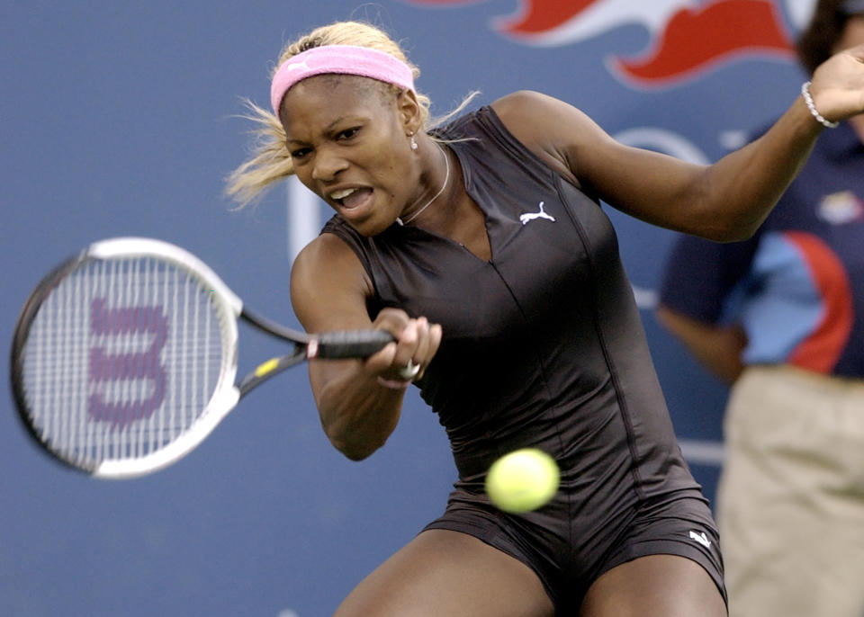 FILE - Serena Williams, of the United States, makes a return to compatriot Lindsay Davenport during their semifinal match at the U.S. Open tennis tournament, Friday, Sept. 6, 2002, in New York. Saying “the countdown has begun,” 23-time Grand Slam champion Serena Williams announced Tuesday, Aug. 9, 2022, she is ready to step away from tennis so she can turn her focus to having another child and her business interests, presaging the end of a career that transcended sports. (AP Photo/Elise Amendola, File)