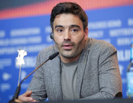 Director Ivo Ferreira attends a news conference to promote the movie Cartas da guerra (Letters from War) at the 66th Berlinale International Film Festival in Berlin February 14, 2016. REUTERS/Stefanie Loos