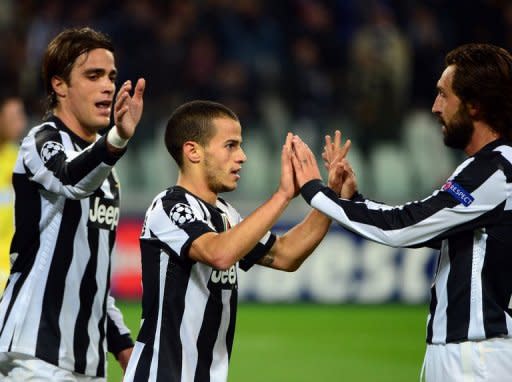 Juventus's Sebastian Giovinco (C) celebrates with teammates Andrea Pirlo (R) and Alessandro Matri during a Champions League on November 7. Juventus's hopes of being among the last 16 could be decided by their clash against Chelsea on Tuesday