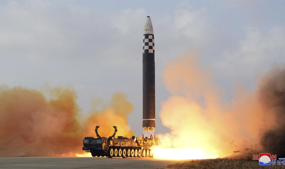 FILE - This photo provided by the North Korean government shows the test-firing of what it says a Hwasong-17 intercontinental ballistic missile at Pyongyang International Airport in Pyongyang, North Korea, on Nov. 18, 2022. In a major break from its strictly self-defense-only postwar principle, Japan adopted a national security strategy Friday, Dec. 16, 2022, declaring plans to possess preemptive strike capability and cruise missiles within years to give itself more offensive footing against threats from neighboring China and North Korea. (Korean Central News Agency/Korea News Service via AP, File)