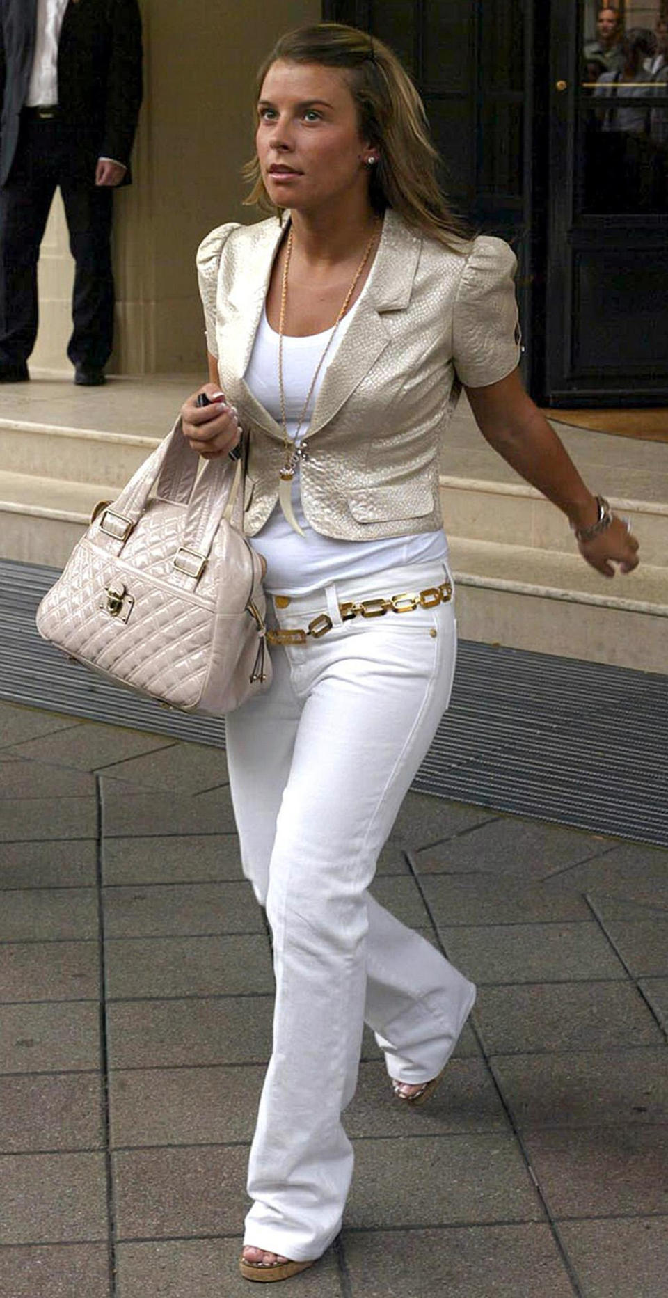 White jeans and low-slung chain belts