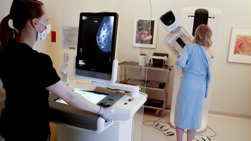 Registered radiologic technologist Holly Speer performs a mammogram on Heather Simonsen at the Huntsman Cancer Institute in Salt Lake City on Friday, April 7, 2023.