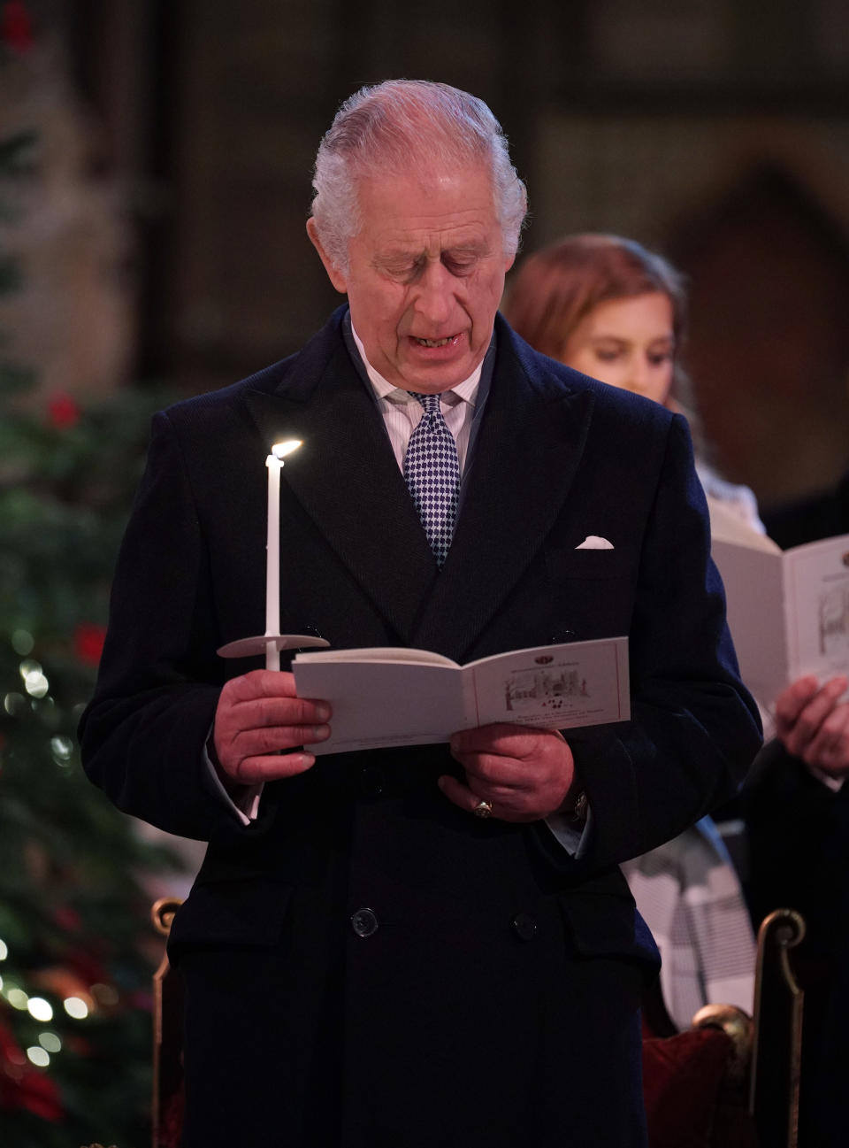 LONDON, ENGLAND - DECEMBER 15: In this photo released on December 24, King Charles III is seen during the 'Together at Christmas' Carol Service at Westminster Abbey on December 15, 2022 in London, England.  The service will be broadcast on ITV1 on Christmas Eve as part of a Royal Carols: Together At Christmas programme, narrated by Catherine Zeta Jones and featuring an introduction by Catherine, Princess of Wales and tributes to Queen Elizabeth II. (Photo Yui Mok - Pool/Getty Images)