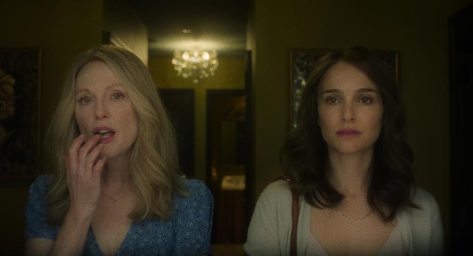 Julianne Moore (left) plays the wife of a notorious married couple and Natalie Portman is the actress playing her in a movie in the dramedy "May December."
