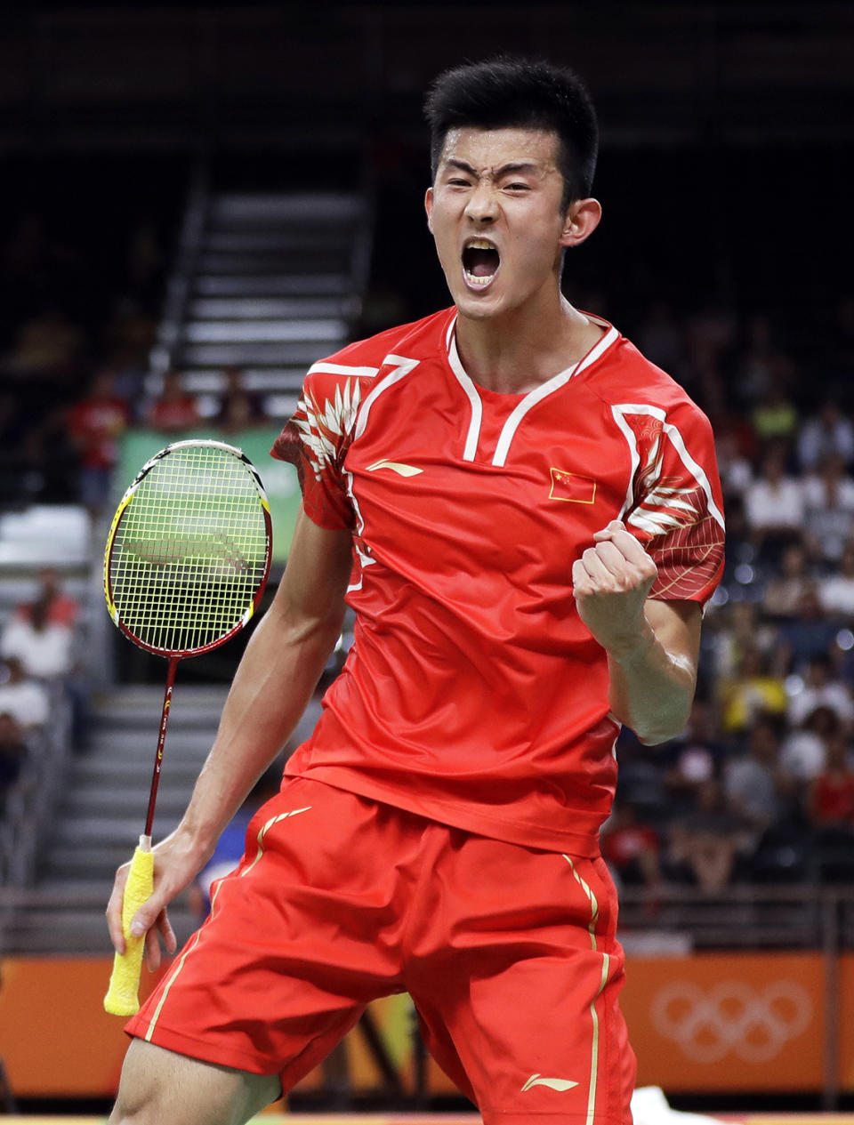 <p>Chen Long of China celebrates after defeating Chong Wei Lee of Malaysia to win the Men’s Singles Badminton Gold Medal match at the 2016 Summer Olympics in Rio de Janeiro, Brazil, on Aug. 17, 2016. (AP Photo/Kin Cheung) </p>