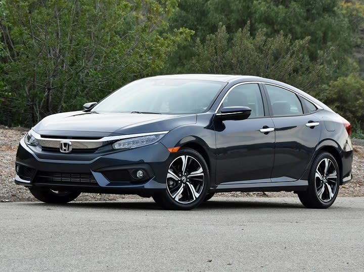 2016 Honda Civic Sedan Touring front quarter left photo