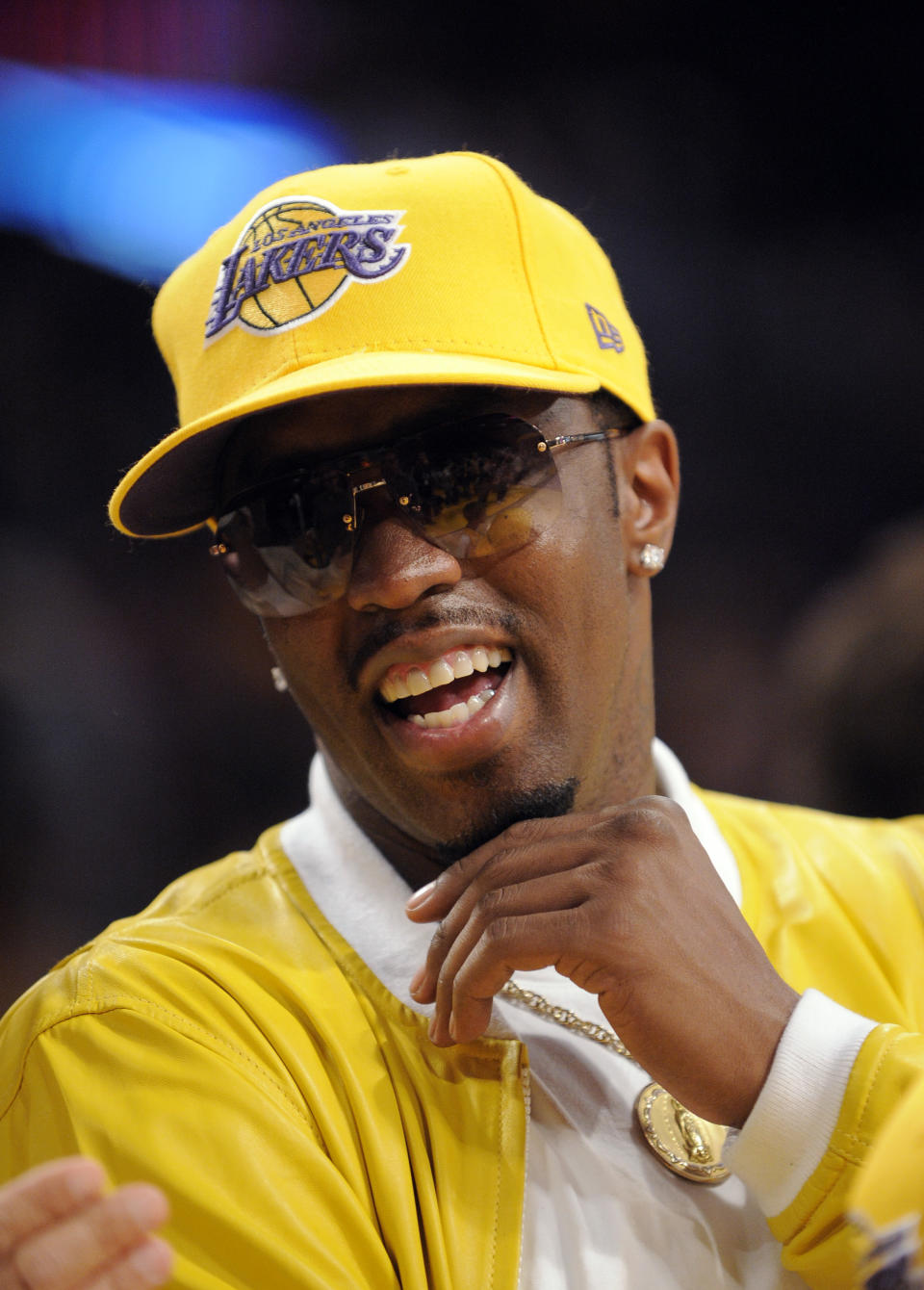 FILE - In this June 7, 2009, file photo, Music mogul Sean Combs sits courtside during the first half of Game 2 of the NBA basketball finals between the Los Angeles Lakers and Orlando Magic in Los Angeles. If Donald Sterling is compelled to sell the Los Angeles Clippers, the list of potential buyers will have more stars than the team's roster. Combs tweeted his interest in going after the Clippers. (AP Photo/Mark J. Terrill, File)