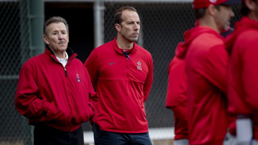 Angels owner Arte Moreno, left, and general manager Billy Eppler watch batting practice during spring training Feb. 18, 2019