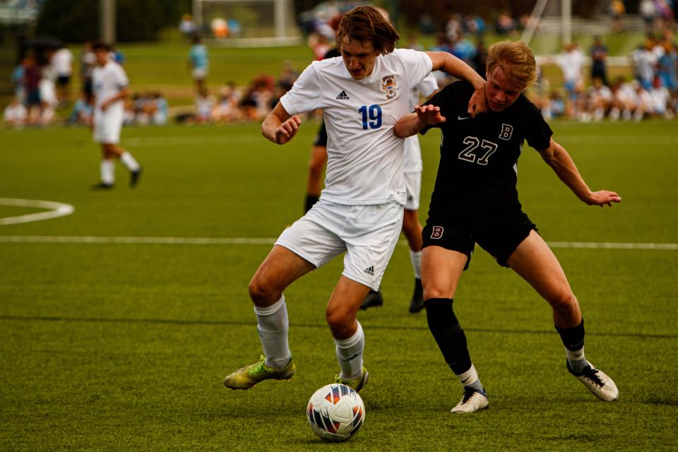 Brentwood Bruins Jack Elliott (19) pushes Bearden Bulldogs Shawn Spencer (27) away during a 2023 TSSAA boys soccer state tournament game at the Richard Siegel Soccer Complex in Murfeesboro, Tenn.  on May.  23, 2023.