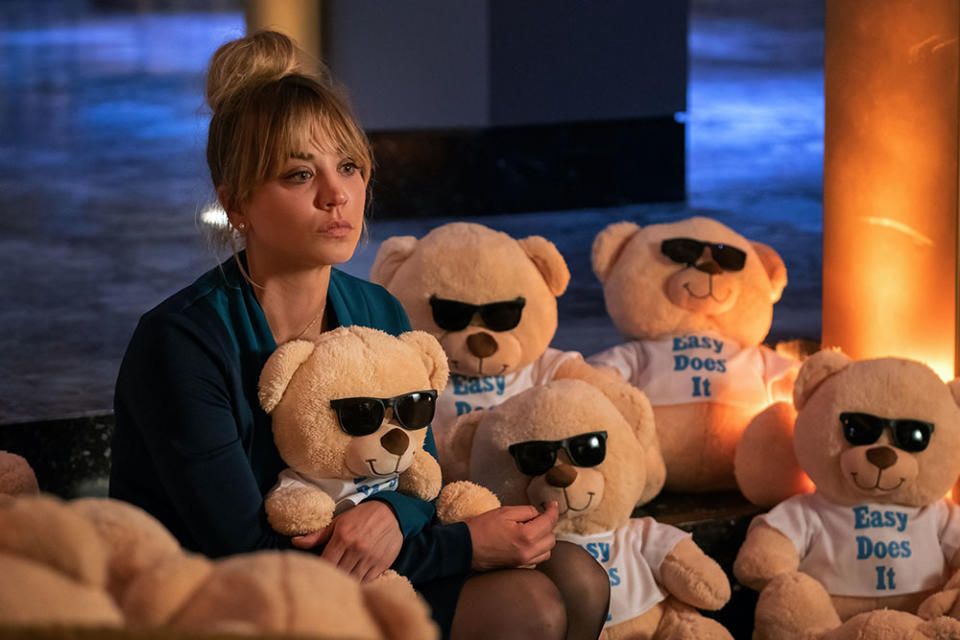 Cassie (Kaley Cuoco), pictured here surrounded by stuffed bears gifted by Cassie’s brother to encourage her sobriety, later comes upon a giant teddy bear, in her mind. - Credit: Courtesy of  Lara Solanki/HBOMax