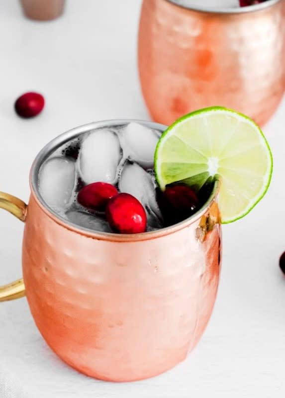 <p>Hot Eats and Cool Reads</p><p>A bright splash of cranberry flavor transforms the classic Moscow Mule cocktail into a new festive cranberry favorite.</p><p><strong>Get the recipe: <a href="https://www.hoteatsandcoolreads.com/2020/11/cranberry-moscow-mule-recipe.html" rel="nofollow noopener" target="_blank" data-ylk="slk:Cranberry Moscow Mule;elm:context_link;itc:0;sec:content-canvas" class="link rapid-noclick-resp">Cranberry Moscow Mule</a></strong></p>