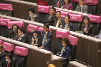 Parliament member from the Pheu Thai Party Sutin Klangsang speaks during a Parliament session in Bangkok, Thailand, Thursday, Sept. 24, 2020. Lawmakers in Thailand are expected to vote Thursday on six proposed amendments to the constitution, as protesters supporting pro-democratic charter reforms gathered outside the parliament building. (AP Photo/Sakchai Lalit)