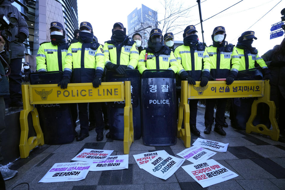 Banners are displayed on the road during a rally opposing Japan's adoption of a new national security strategy near the Japanese Embassy in Seoul, South Korea, Tuesday, Dec. 20, 2022. North Korea threatened Tuesday to take "bold and decisive military steps" against Japan as it slammed Tokyo's adoption of a national security strategy as an attempt to turn the country into an aggressive military power. The banners read "Stop military cooperation between South Korea, the U.S. and Japan military alliance." (AP Photo/Ahn Young-joon)