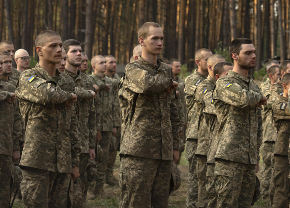 Newly recruited soldiers of Ukraine's 3rd Assault Brigade line up at a military base close to Kyiv, Ukraine, Monday, Sept. 25, 2023. The loss of the city of Avdiivka in February, 2024 marked the end of a long, exhausting defense for the Ukrainian military. One brigade had defended the same block of buildings for months without a break. (AP Photo/Efrem Lukatsky)