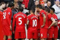 Britain Soccer Football - Liverpool v Everton - Premier League - Anfield - 1/4/17 Liverpool players gather around manager Juergen Klopp Reuters / Phil Noble Livepic