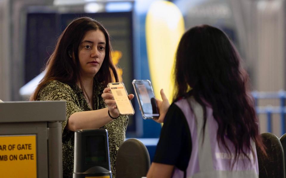 Train station staff have been forced to manually scan train tickets at Waterloo station due to the global IT outage