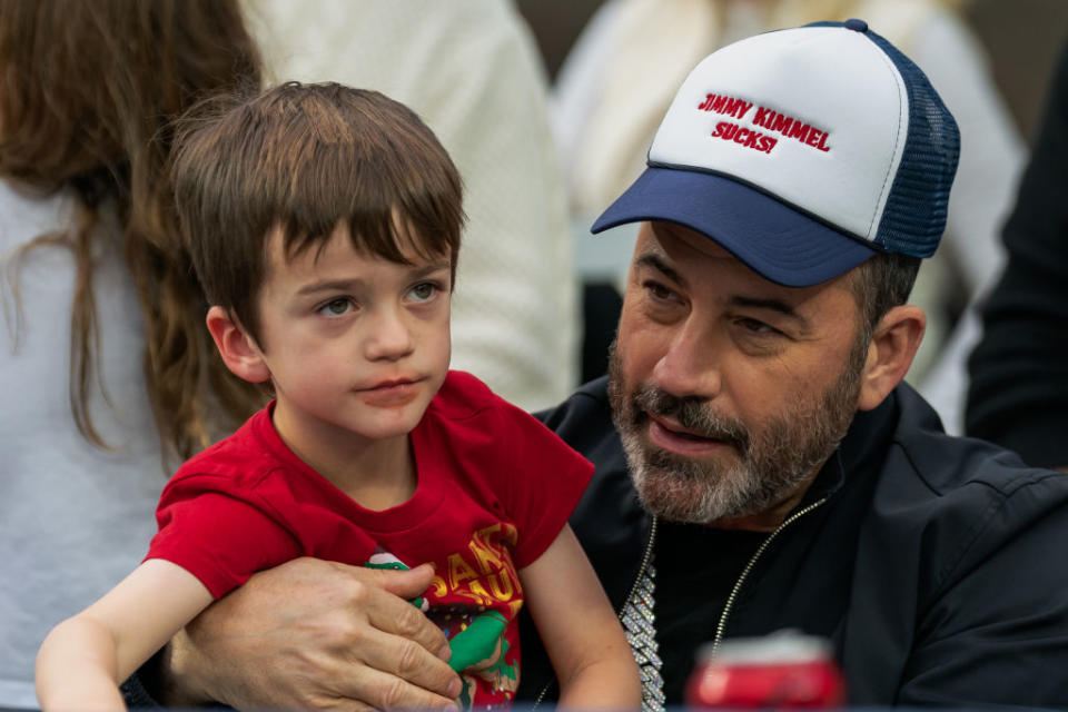 LOS ANGELES, CA - DECEMBER 17: Jimmy Kimmel holds his son Billy Kimmel during the LA Bowl game between Washington State Cougars and Fresno State Bulldogs at SoFi Stadium on December 17, 2022 in Los Angeles, California. (Photo by Jason Allen/ISI Photos/Getty Images)