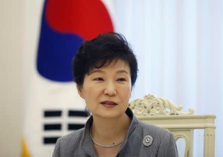 South Korean President Park Geun-hye speaks during an interview with Reuters at the Presidential Blue House in Seoul September 16, 2014. REUTERS/Kim Hong-Ji (