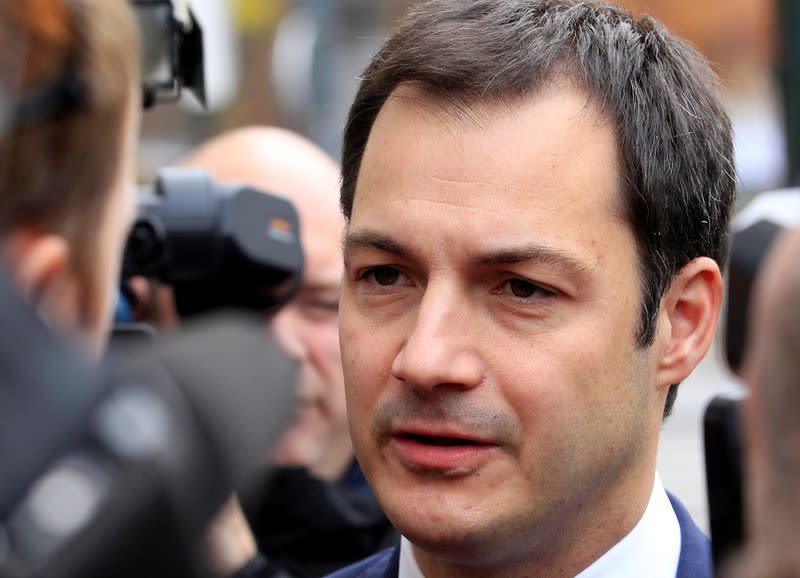 FILE PHOTO: Belgian Flemish Liberal party politician Alexander De Croo arrives at a cabinet meeting in Brussels