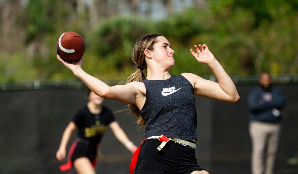 Zoey O'Nan, a member of the girls flag football team at Riverdale High School prepares to pass the ball during a scrimmage on Monday, Feb. 12, 2024.