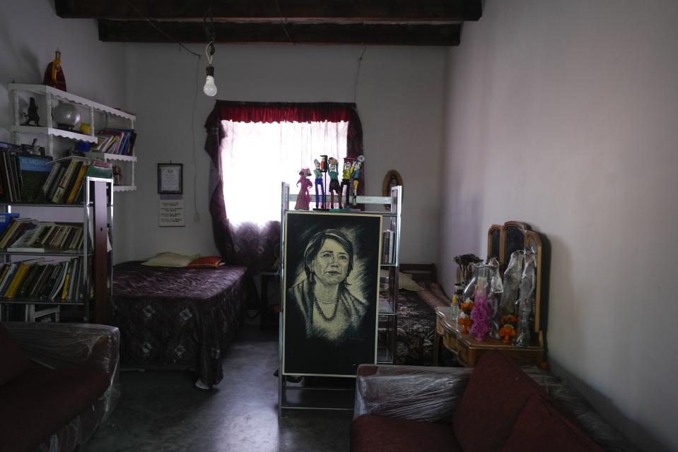 FILE - A charcoal drawing depicting opposition presidential candidate Xóchitl Gálvez, and other gifts from her constituents, decorate her childhood bedroom she shared with her sisters, in Tepatepec, Mexico, May 10, 2024. (AP Photo/Fernando Llano, File)
