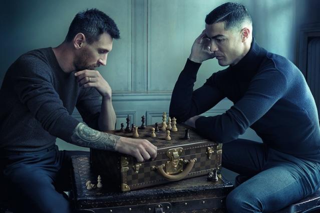 Cristiano Ronaldo and Lionel Messi Taking Photo playing chess in