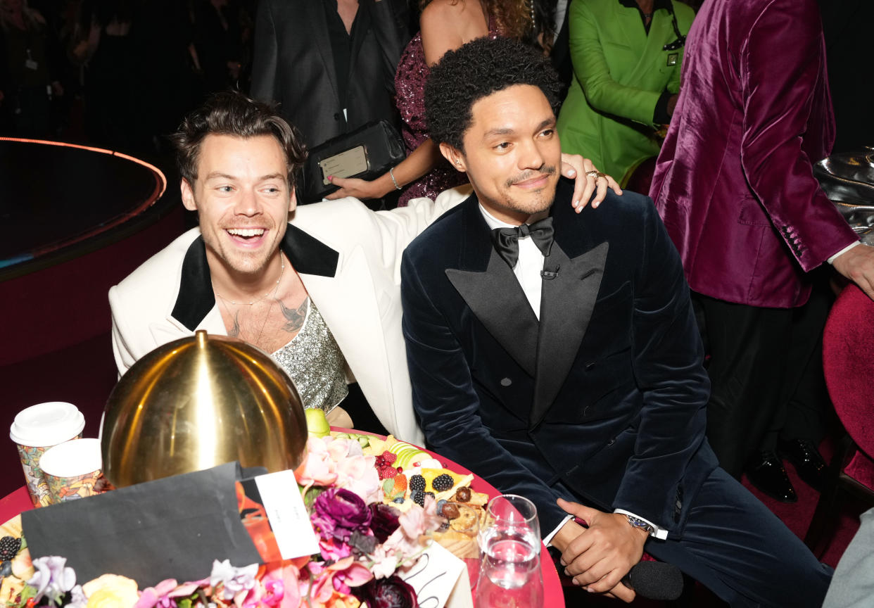 LOS ANGELES, CALIFORNIA - FEBRUARY 05: (L-R) Harry Styles and host Trevor Noah attend the 65th GRAMMY Awards at Crypto.com Arena on February 05, 2023 in Los Angeles, California. (Photo by Kevin Mazur/Getty Images for The Recording Academy)