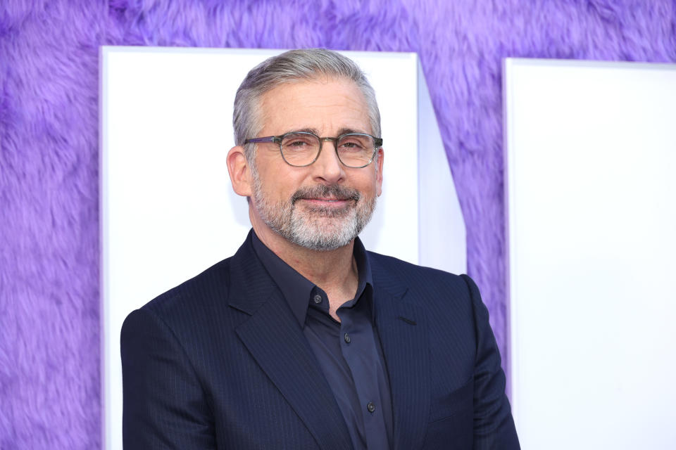 Steve Carell in a dark suit on the red carpet