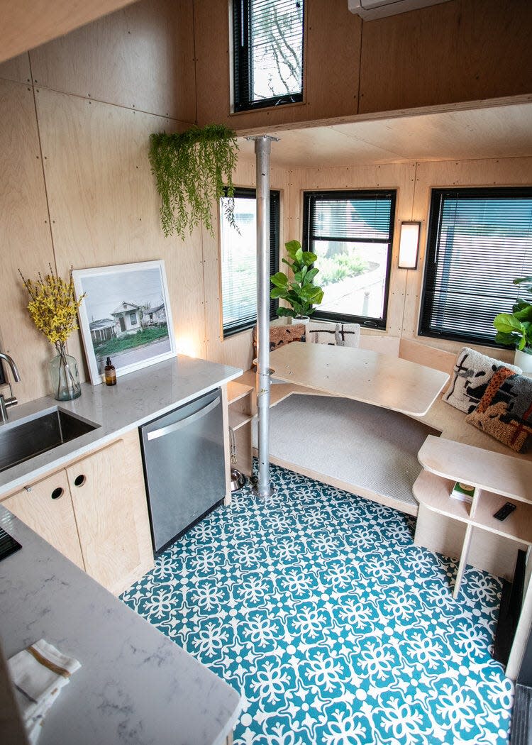 This is the kitchen and dining area in a tiny house designed by No Nonsense Housing Company, an initiative of architect and urban planner Andres Duany, who designed Seaside. Duany now is turning his attention affordable workforce housing, which is lacking in Walton County.