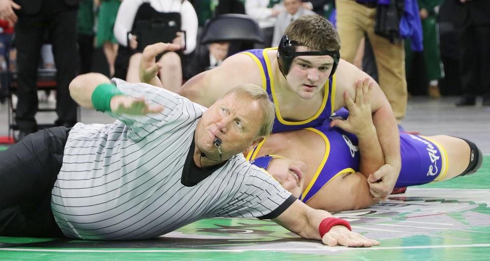 Referee Gregg Roach of Brookings slaps the match to signify that Redfield's Grady Fey had capped a 49-0 senior season with Class B boys' 285-pound state championship in the South Dakota State Individual Wrestling Tournament on Saturday, Feb. 24, 2024 at the Denny Sanford PREMIER Center in Sioux Falls. Fey pinned defending champion Traun Cook of Canton.