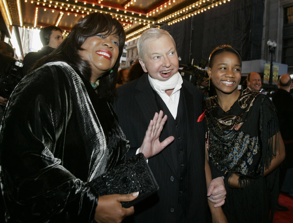 FILE - In this May 3, 2007 file photo, film critic Roger Ebert, center, his wife Chaz, left, and their granddaughter Raven Evans, arrive for the Chicago premiere of the the Broadway hit "The Color Purple." When "Life Itself" debuts Sunday, Jan. 19, 2014, at the Sundance Film Festival it will be the first time Ebert's wife, Chaz, will see the full documentary about her late husband's life. "Life Itself" includes footage that director Steve James gathered over the final four months before the famed film critic died last April after a long battle with cancer. (AP Photo/Charles Rex Arbogast, File)