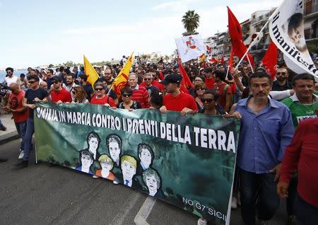 Demonstrators protest against the G7 summit in Giardini Naxos near Taormina, Sicily, Italy, May 27, 2017. REUTERS/Yara Nardi