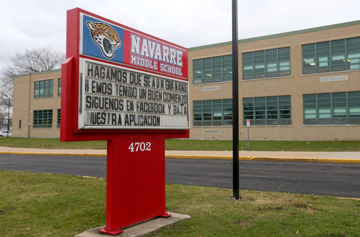 The message board has one side in English and the other in Spanish Thursday, Dec. 15, 2022, at Navarre Middle School in South Bend. Navarre is in the South Bend school district's empowerment zone.