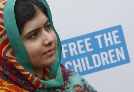 Malala Yousafzai arrives for the We Day UK event at Wembley Arena in London March 7, 2014. REUTERS/Luke MacGregor/Files