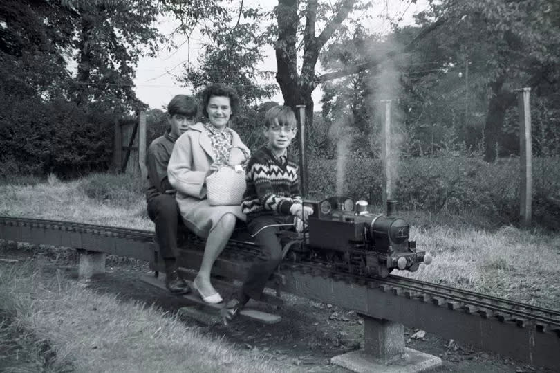 A family on what is now known as the Merseyside Live Steam and Model Engineers site in Calderstones Park, Liverpool, in the 1960s