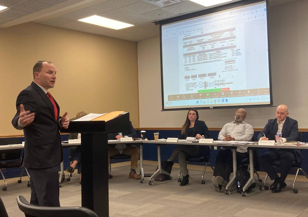 Erie County Executive Brenton Davis, on left, implores the Erie County Gaming Revenue Authority to improve its transparency during a meeting on Feb. 15, 2024. At right are ECGRA board members Angela Amatangelo and Dale Barney and ECGRA Executive Director Perry Wood.